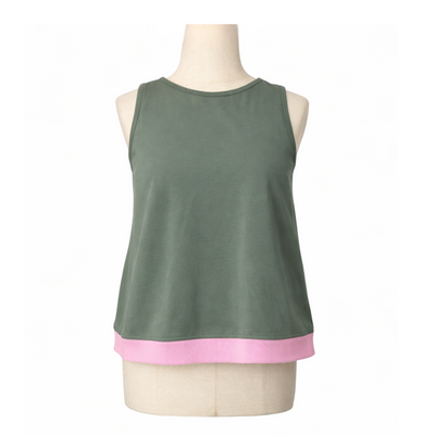 green women's tank with pink hem on a mannequin