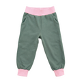 Green children's pants with pink cuffs on a white background