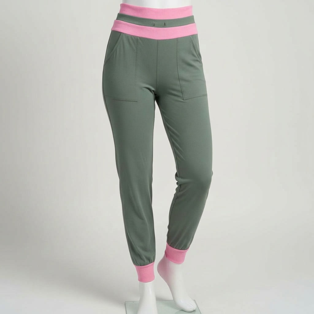 green and pink joggers on a mannequin