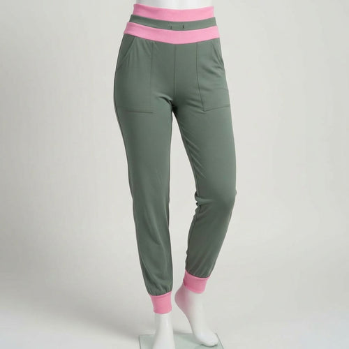 green and pink joggers on a mannequin